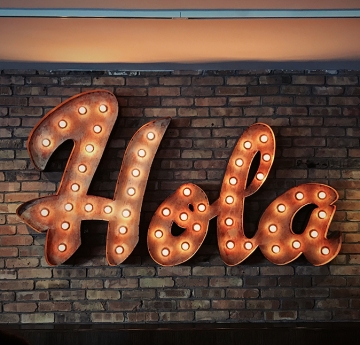Hola lighted sign